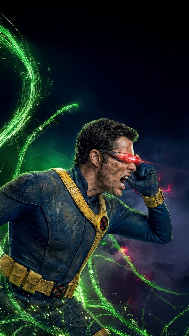 Cyclops firing a red optic blast from his visor amid smoke and rubble